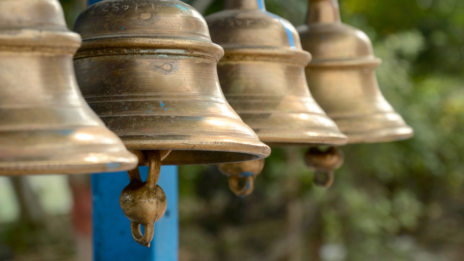 Vrindavan temple bell. the faithful ring when entering the temple. india  Stock Photo - Alamy